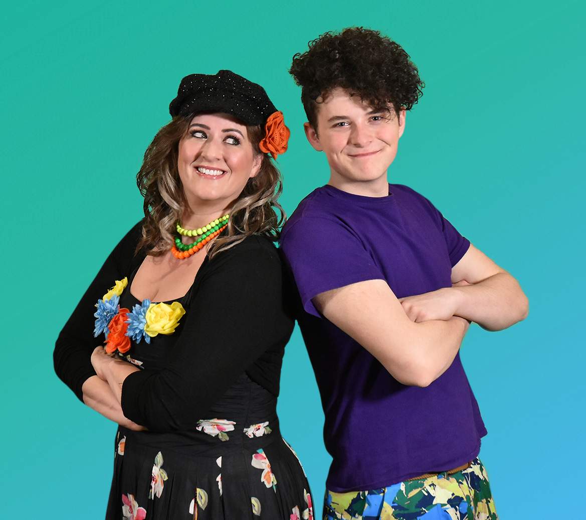 Madame Diva and Micah standing back to back